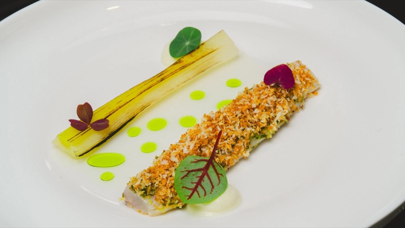 Charred leek and crusted fish